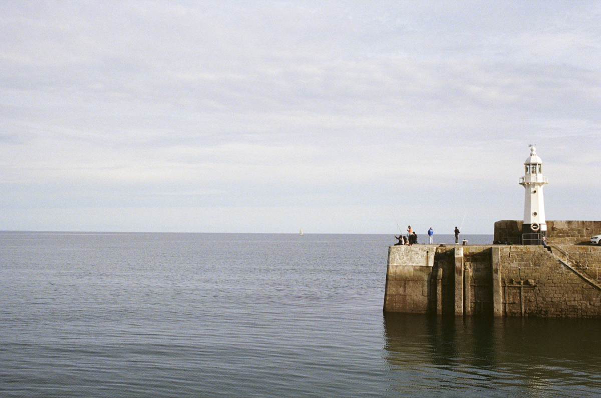 Photographed in Fowey and Charlestown, Cornwall, showcasing classic 35mm rendering in varied seaside conditions.